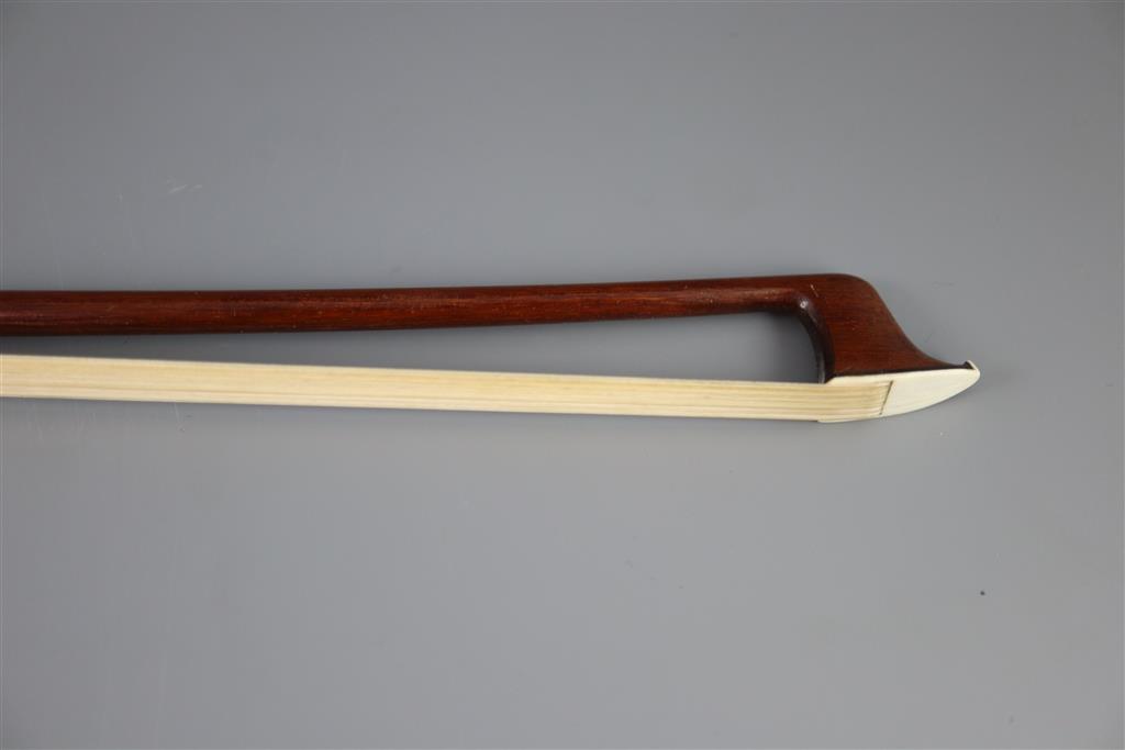 A late 19th/early 20th century silver mounted bow, unmarked, 74cm long